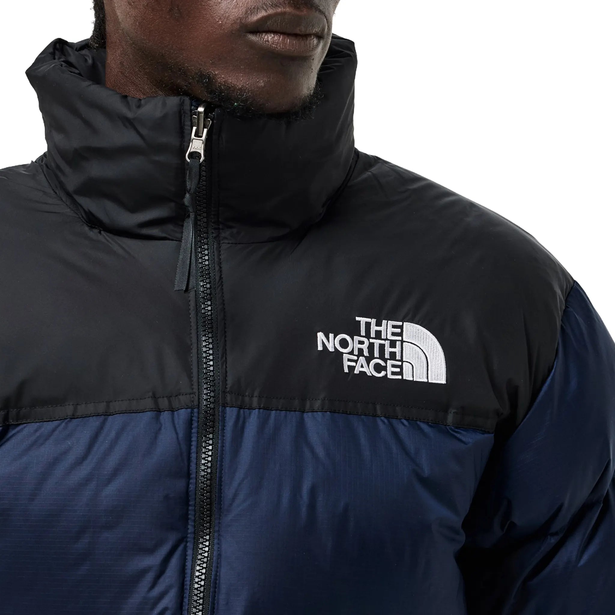 Model Detailed View of The North Face 1996 Retro TNF Navy Jacket